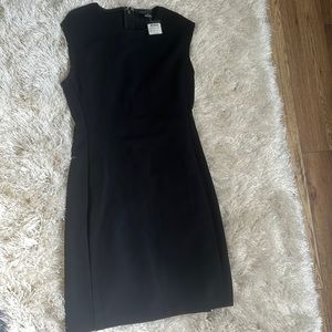 Black bodycon dress from Club Monaco. NWT size 4